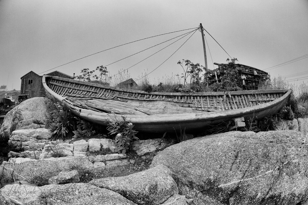NovaScotia_71.JPG - Left to weather - old fishing boat that has seen better days.  On the rocks at Peggy's Cove.