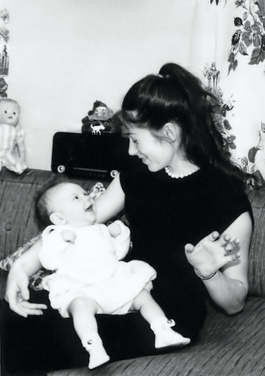 D04_April1959.jpg - April 1959.  It looks like Mom is trying to get Debby to look at the camera.