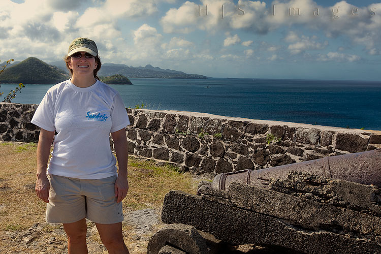 2010_01_18_SandalsGrandeStLucian-10119-web.jpg - Unlike my favorite Canon this one can not be worn slung about my neck.  This is taken in the ruins of Fort Henry.  The wind was strong on top of the fort, which is why I'm wearing my hat nearly down to my nose.  It was a short but nice hike to get up there, most of the way was paved at some long time past and there were handrails for the very steep parts.