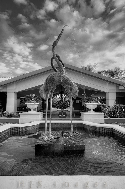 2010_01_21_SandalsGrandeStLucian-10019_20_21-Web.jpg - These two beautiful statues were in the courtyard just outside of the reception area.  This was an early morning image for not just the light but because anytime after 8Am there were always people milling about in the front area.  The conversion to B&W was done by mistake but once I saw it I loved it.