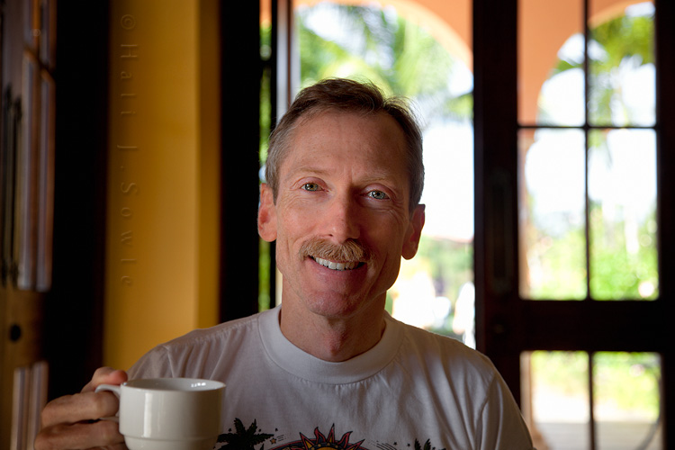 2011_11_SandalsWhitehouse-10219-Edit.jpg - Mike enjoying our morning decaf blue mountain coffee.