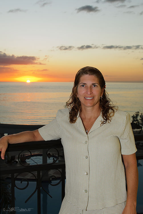 _MIK1163.jpg - Hali enjoying a sunset view from our room.