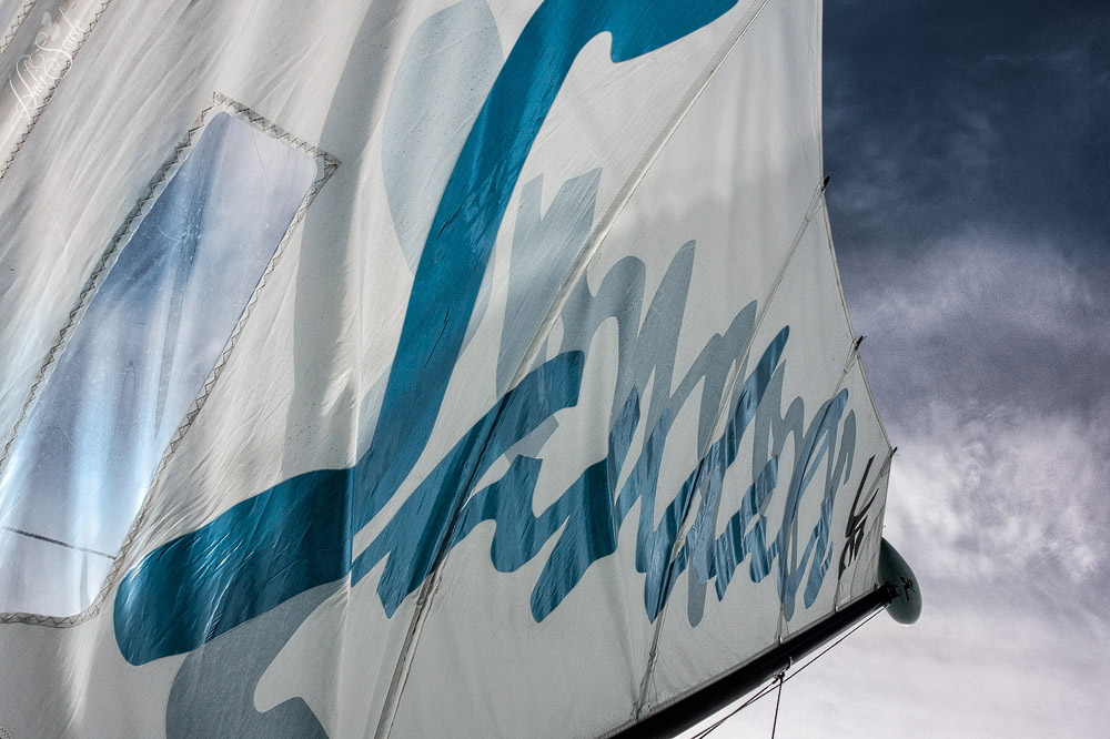 2014_09_SandalsWhitehouse-11178_Edit1000.jpg - Looking upward at the sail of one of the hobiecats while Mike sailed us along in the oh-too-calm wind.