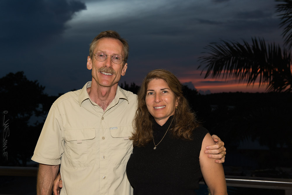 DSC_0292A.jpg - A shot of us on our balcony before dinner (with just a little color left in the sky behind us).