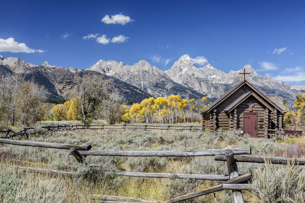2015_09_23_Yellowstone-10464-Edit1000.jpg - The Chapel of the Transfiguration is just outside of Jackson, just inside Grand Teton NP.  It is an Episcopal church that was built in 1925 to serve the guests and ranch workers of the dude ranches that were in the Tetons.  It predated the formation of Grand Teton NP which occurred in 1929.  It was featured in the movie Spencer's Mountain a 1963 movie staring Henry Fonda and Maureen O'Hara.