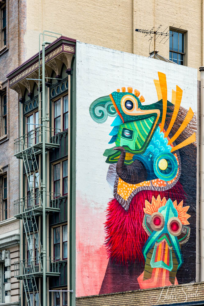 2015_05_California-10486-Edit1000a.jpg - Yet another Chinatown mural on a wall above shops.