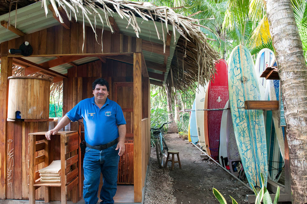 CostaRica2013_19.JPG - The surf board security station is manned 24/7, and is on the way to the beach.  Stop by to grab your stick, a towel, and maybe a glass of water.
