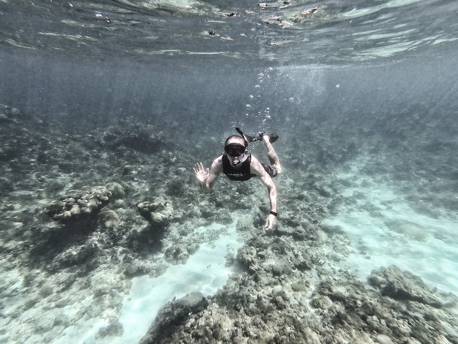 2021_09_SandalsSouthCoast_GoPro-10021-Edit1600.jpg - Mike snorkeling, distortion courtesy of the gopro.